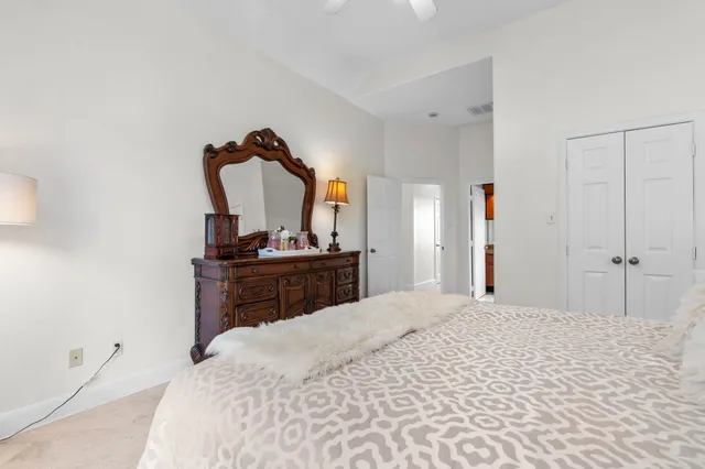 an aerial view of a houses with a outdoor space