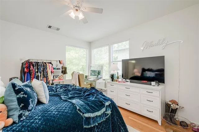 a living room with furniture fireplace and a flat screen tv