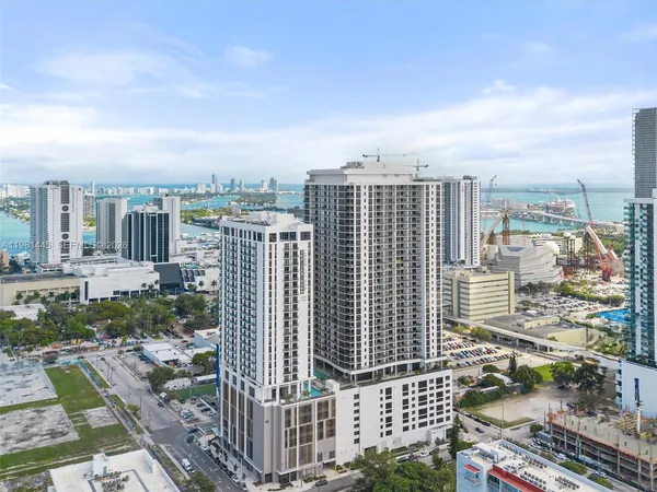 a view of a city with tall buildings