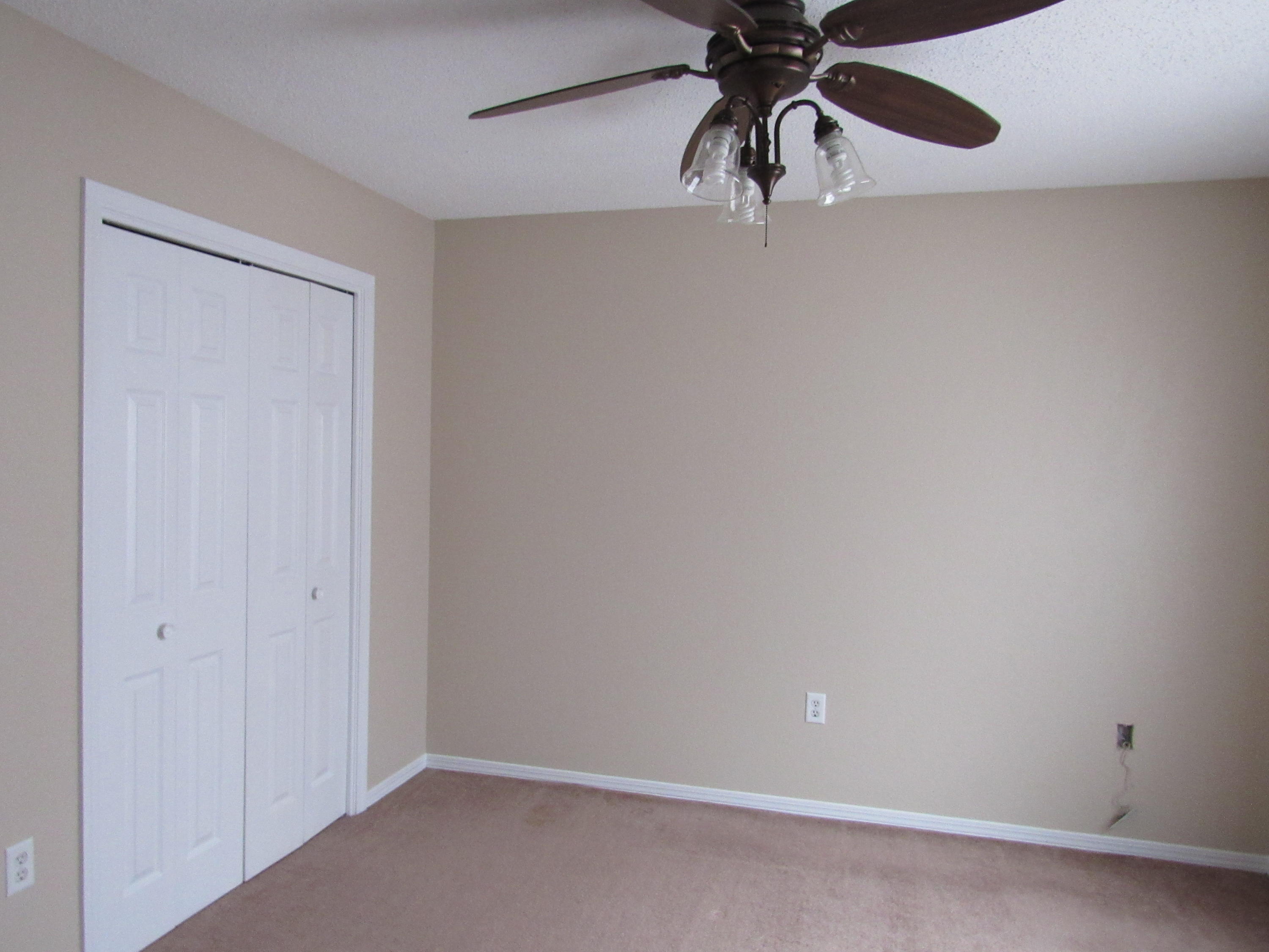 713 Valley Road Crestview, FL 32539 - Photo 14 of 17 a view of a small space with a ceiling fan
