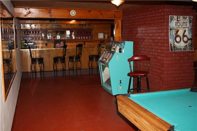 322 Long Road Ardmore, TN 38449 - Photo 19 of 20 Basement Recreation Room - Painted concrete flooring.