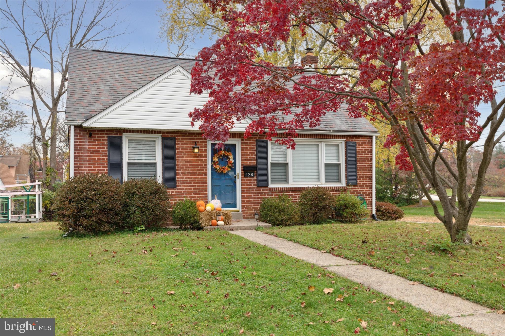 128 Shaffer Road King of Prussia, PA 19406 - Photo 1 of 24 a front view of a house with garden