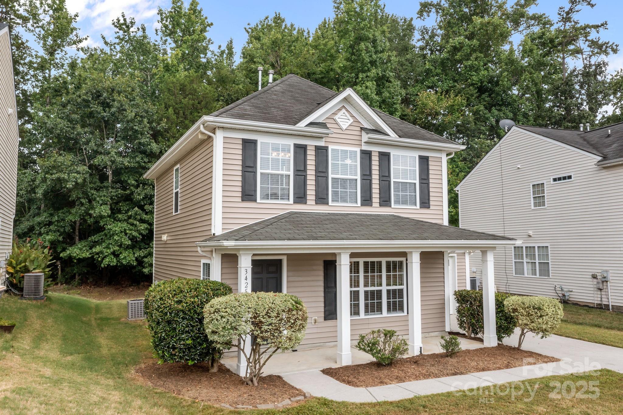 3425 Market View Drive Davidson, NC 28036 - Photo 2 of 23 a front view of a house with garden