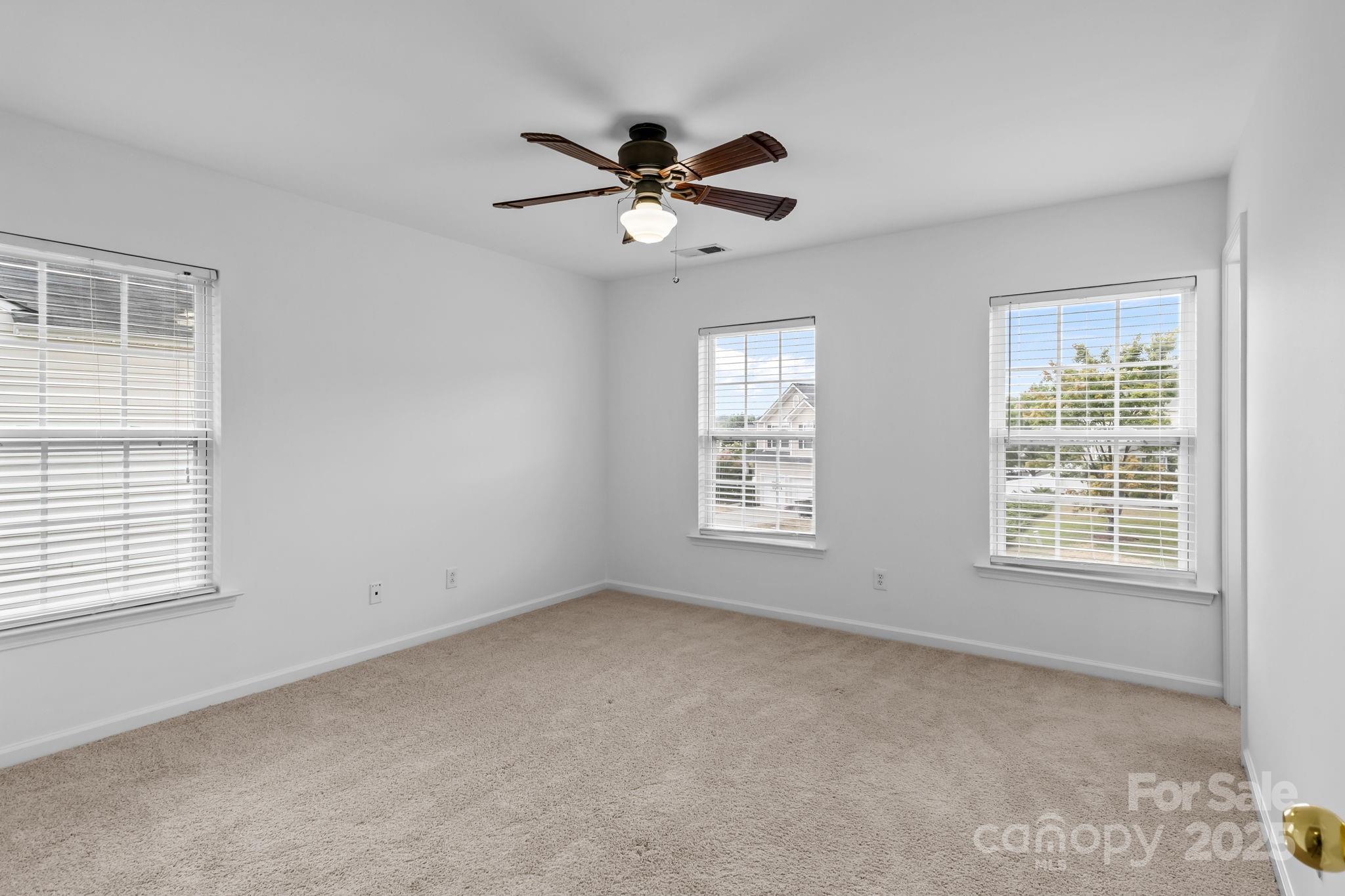 3425 Market View Drive Davidson, NC 28036 - Photo 21 of 23 a view of an empty room with a window
