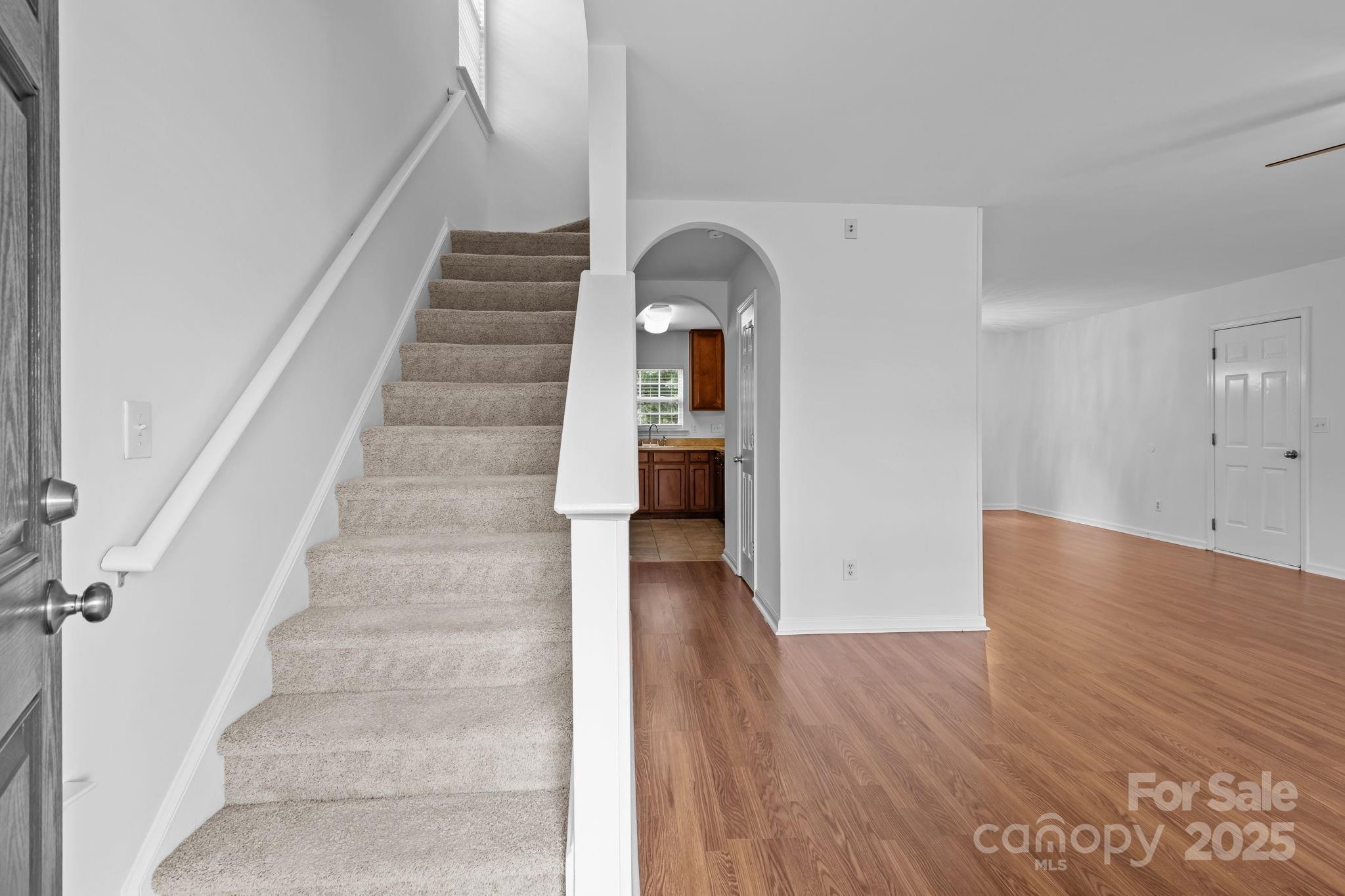 3425 Market View Drive Davidson, NC 28036 - Photo 7 of 23 a view of entryway and hall with wooden floor