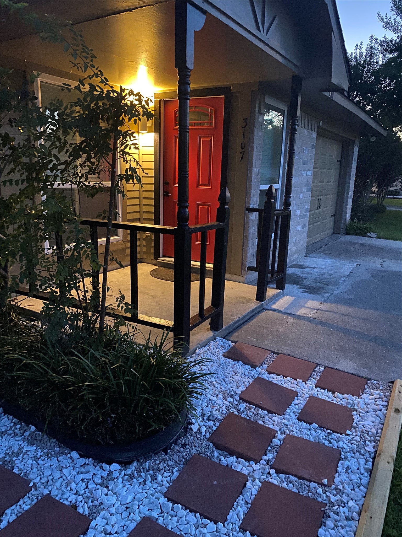 3107 Raccoon Run Spring, TX 77373 - Photo 3 of 35 New front door just before dawn - New landscaping that winds to backyard