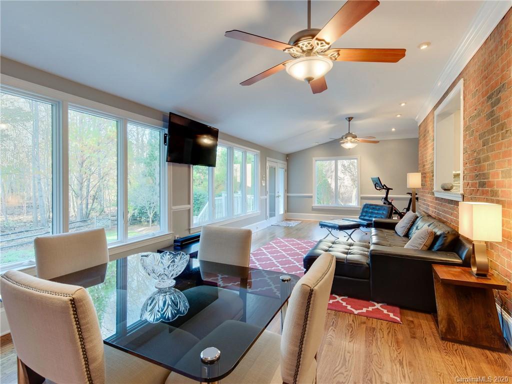 1612 Stevens Ridge Road Matthews, NC 28105 - Photo 20 of 44 a living room with furniture and a flat screen tv