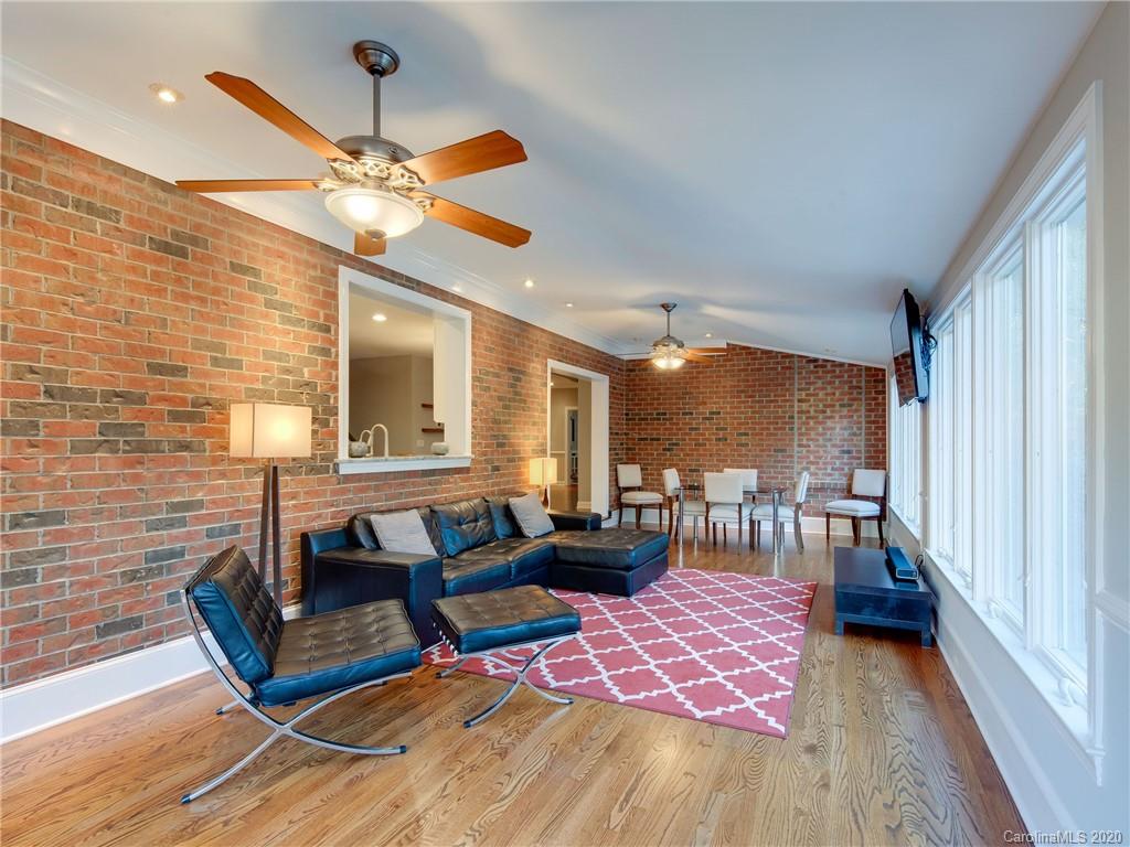 1612 Stevens Ridge Road Matthews, NC 28105 - Photo 21 of 44 a living room with furniture and wooden floor