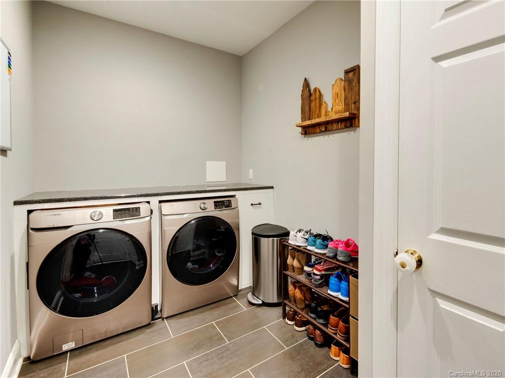 1612 Stevens Ridge Road Matthews, NC 28105 - Photo 22 of 44 a utility room with dryer and washer