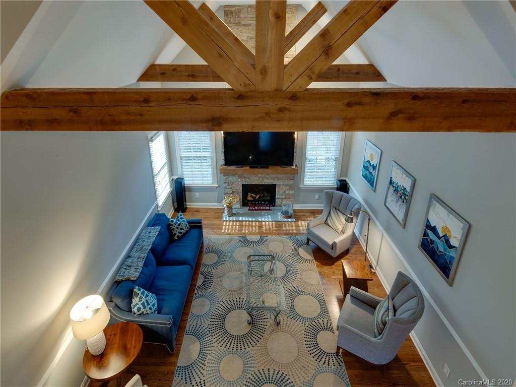 1612 Stevens Ridge Road Matthews, NC 28105 - Photo 24 of 44 a living room with furniture and a flat screen tv