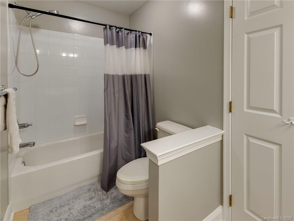 1612 Stevens Ridge Road Matthews, NC 28105 - Photo 33 of 44 a bathroom with a shower a toilet and a sink