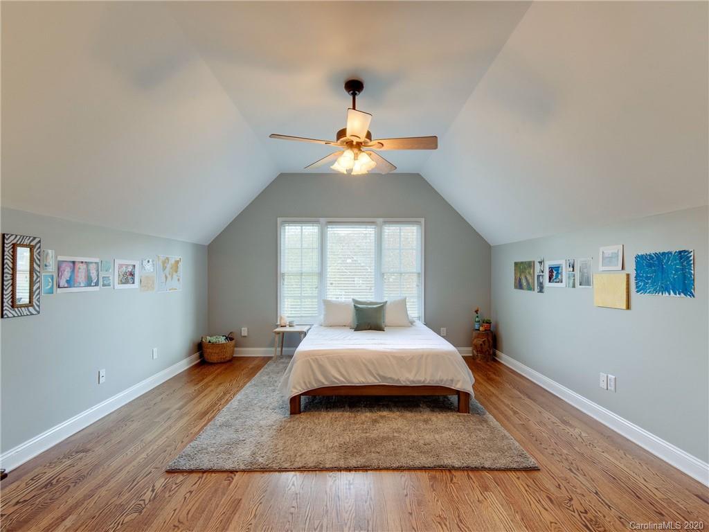1612 Stevens Ridge Road Matthews, NC 28105 - Photo 35 of 44 a bedroom with a bed and a window