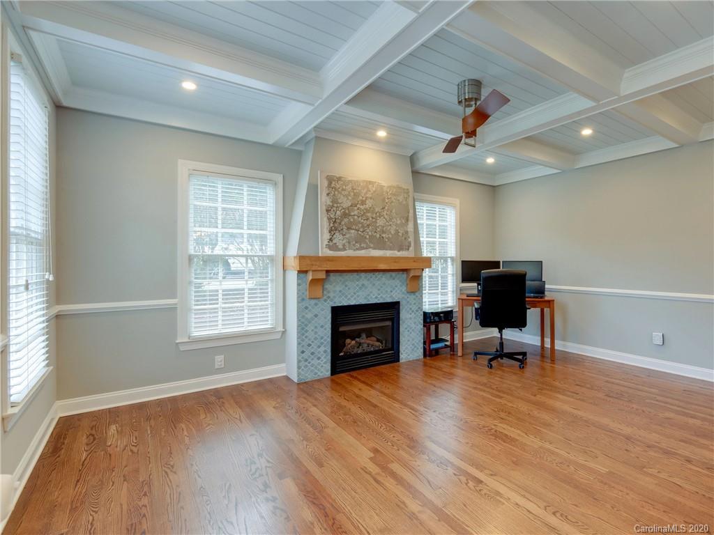 1612 Stevens Ridge Road Matthews, NC 28105 - Photo 5 of 44 an empty room with furniture fireplace and a window