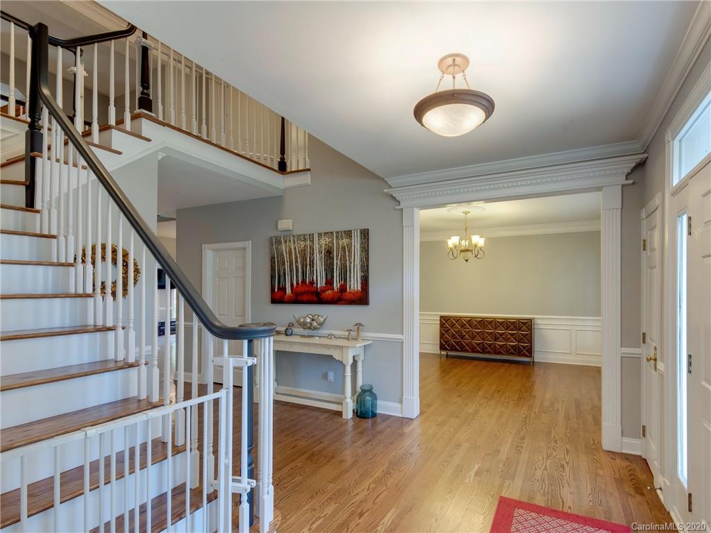 1612 Stevens Ridge Road Matthews, NC 28105 - Photo 7 of 44 a view of entryway livingroom and hall with wooden floor