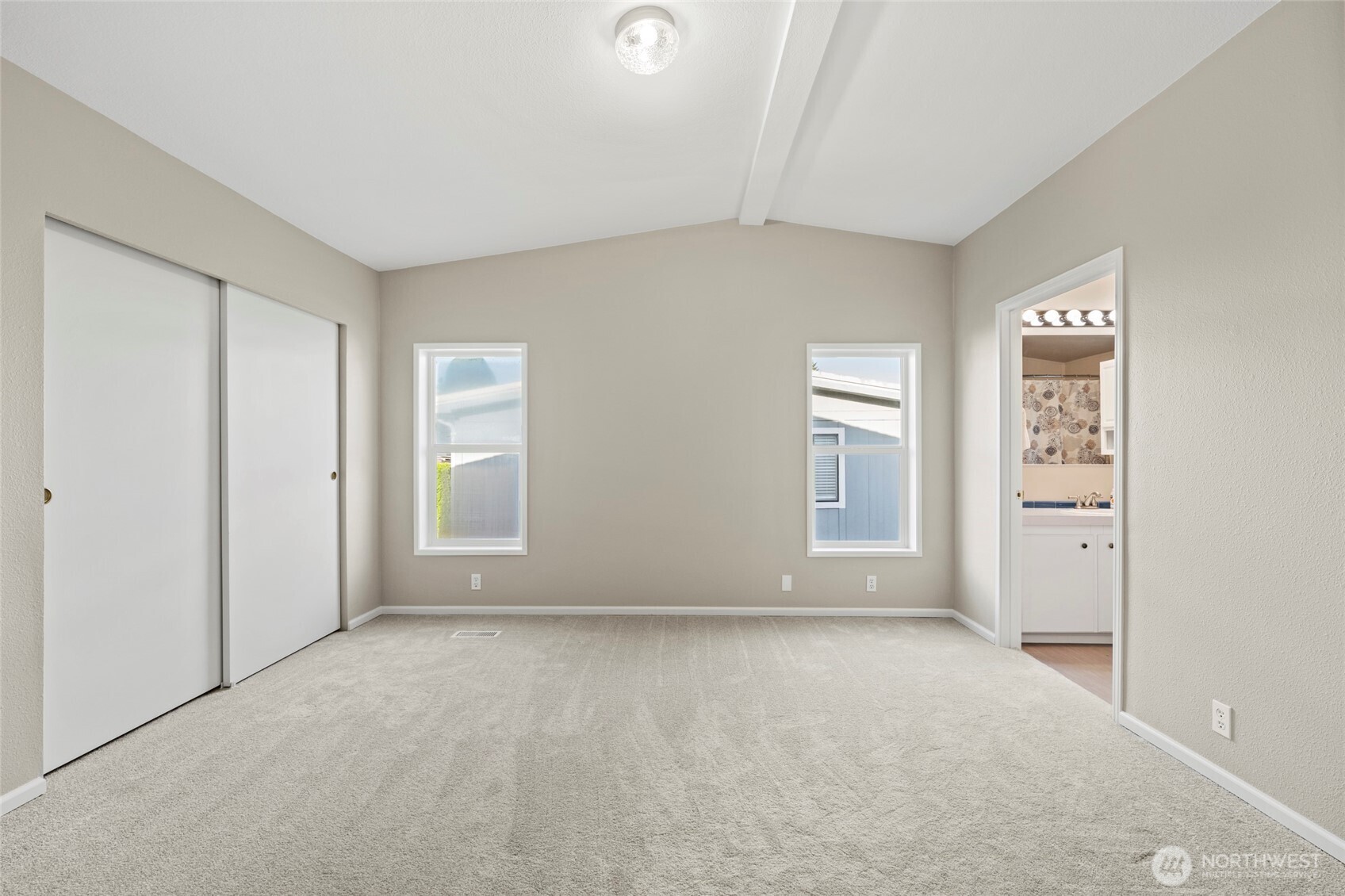 23825 15th Avenue Southeast, Unit 108 Bothell, WA 98021 - Photo 15 of 39 an empty room with windows