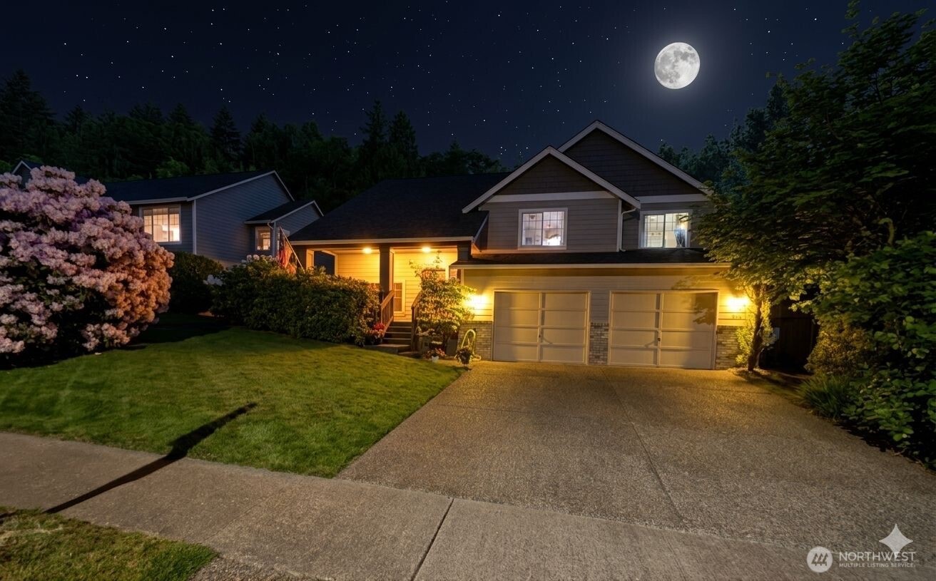 6108 133rd Place Southwest Edmonds, WA 98026 - Photo 10 of 40 a front view of a house with a yard and garage