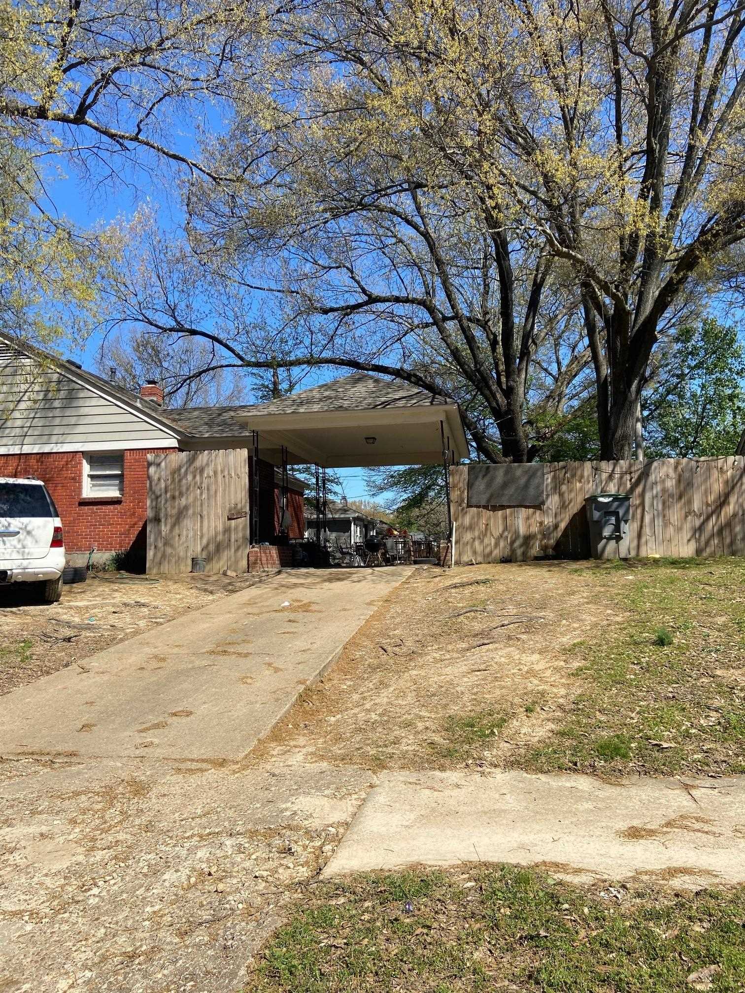 1628 Gilson Road Memphis, TN 38117 - Photo 3 of 3 a view of a backyard of the house
