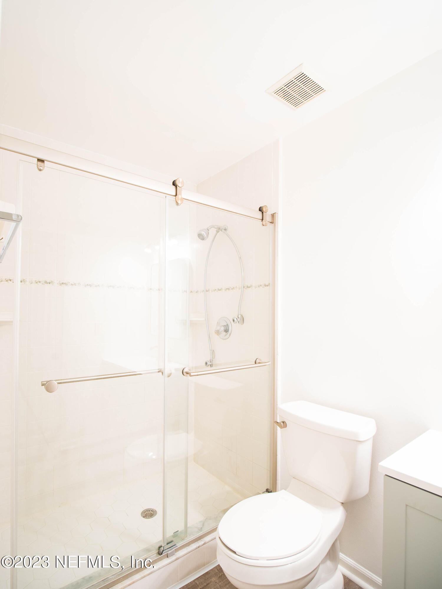 3252 Dowitcher Lane Orange Park, FL 32065 - Photo 16 of 25 a white toilet sitting next to a bathroom sink