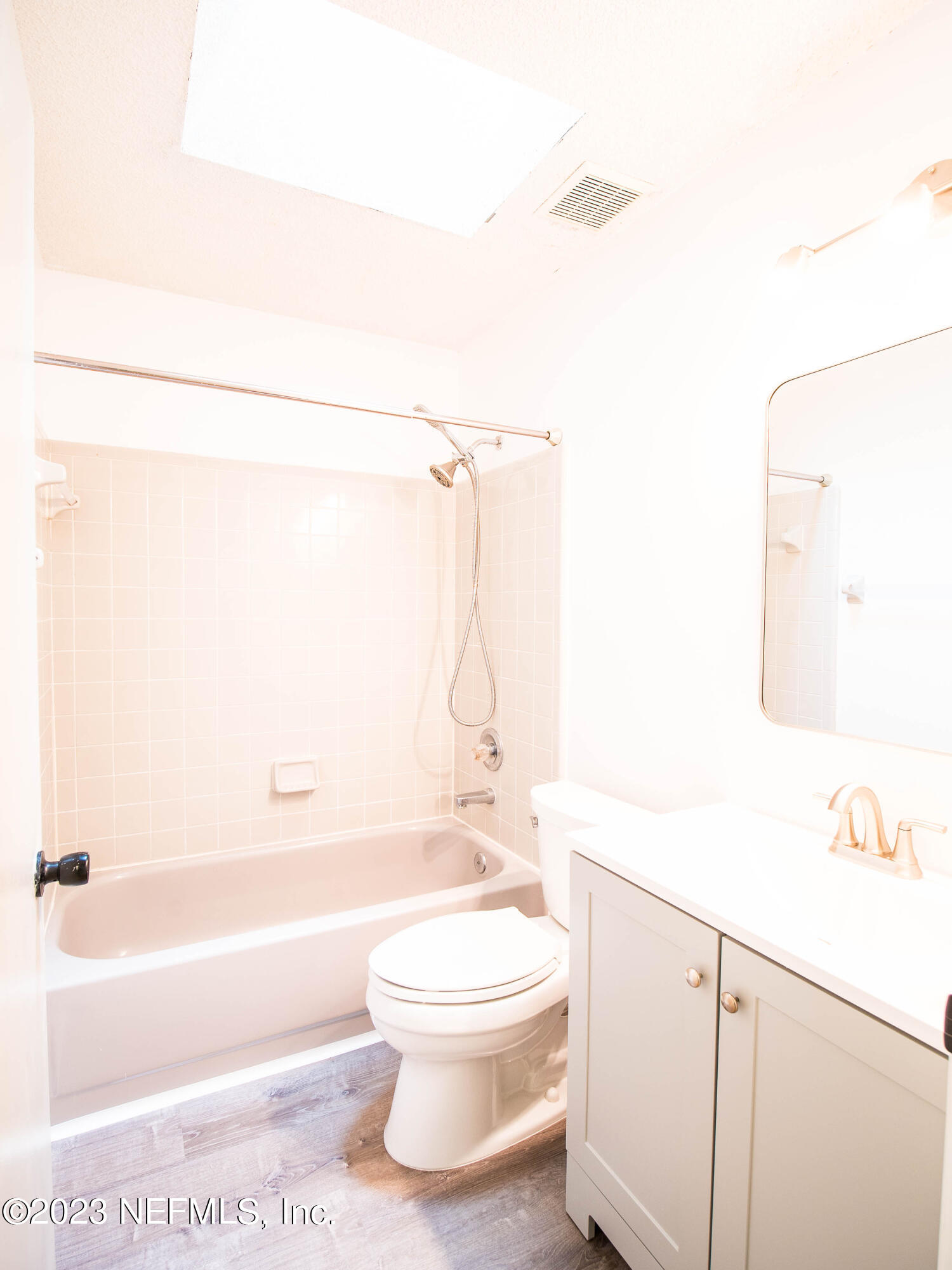 3252 Dowitcher Lane Orange Park, FL 32065 - Photo 19 of 25 a bathroom with a toilet a sink and a bathtub