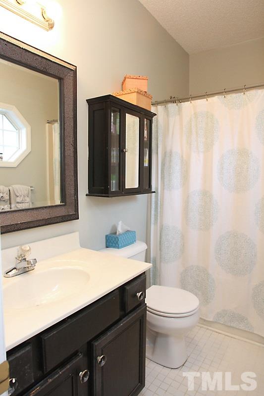 1002 Shackleton Road Apex, NC 27502 - Photo 15 of 19 Master bathroom with tub/shower combo