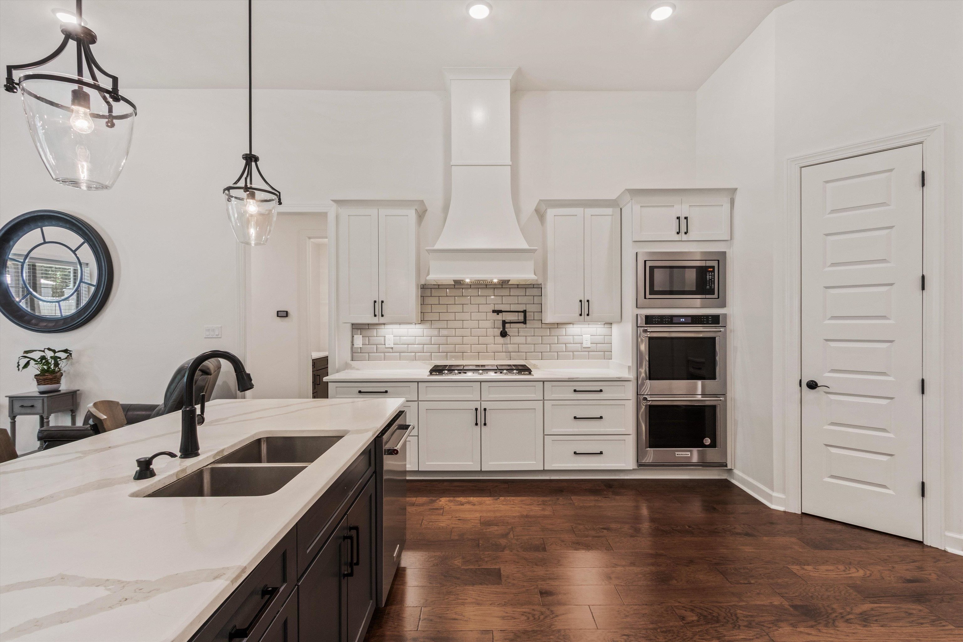 65 Watson Road Oakland, TN 38060 - Photo 12 of 40 a kitchen with a stove oven and a sink