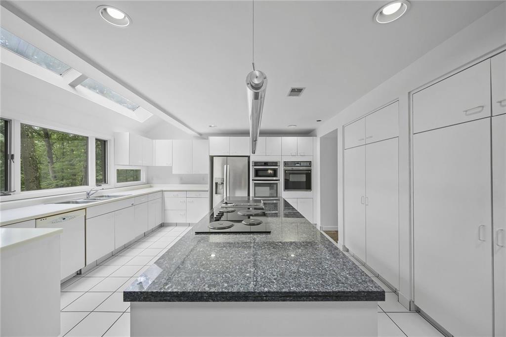 958 Blackburn Road Sewickley, PA 15143 - Photo 22 of 49 a view of kitchen with sink microwave and refrigerator