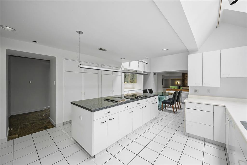 958 Blackburn Road Sewickley, PA 15143 - Photo 25 of 49 a kitchen with a stove a sink and a refrigerator