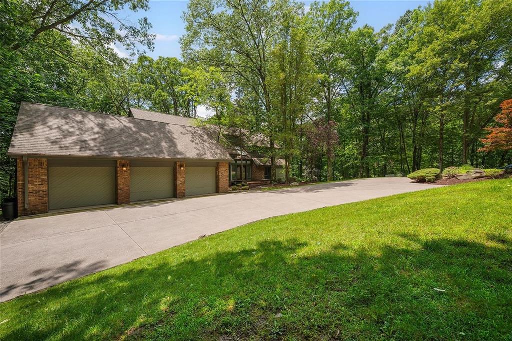 958 Blackburn Road Sewickley, PA 15143 - Photo 44 of 49 a backyard of a house with lots of green space