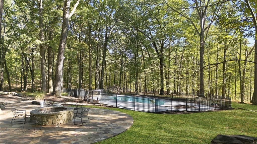 958 Blackburn Road Sewickley, PA 15143 - Photo 47 of 49 a view of a swimming pool with chairs