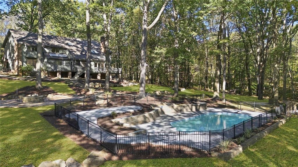 958 Blackburn Road Sewickley, PA 15143 - Photo 5 of 49 a view of swimming pool with a yard and outdoor seating