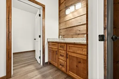 a view of cabinet with wooden floor