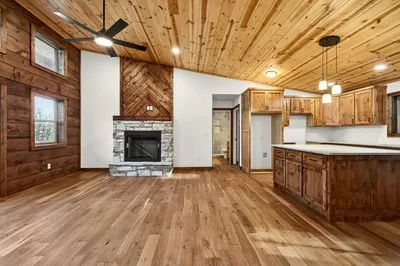a view of a kitchen with a sink and a microwave