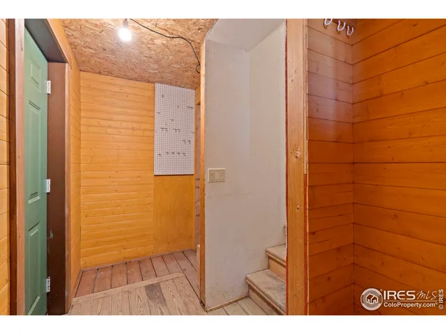 a bathroom with a shower and a sink