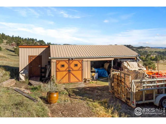 a view of open kitchen with a table and a chair