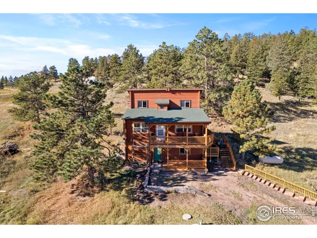 a terrace of a house with outdoor seating