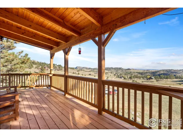 a view of balcony with furniture