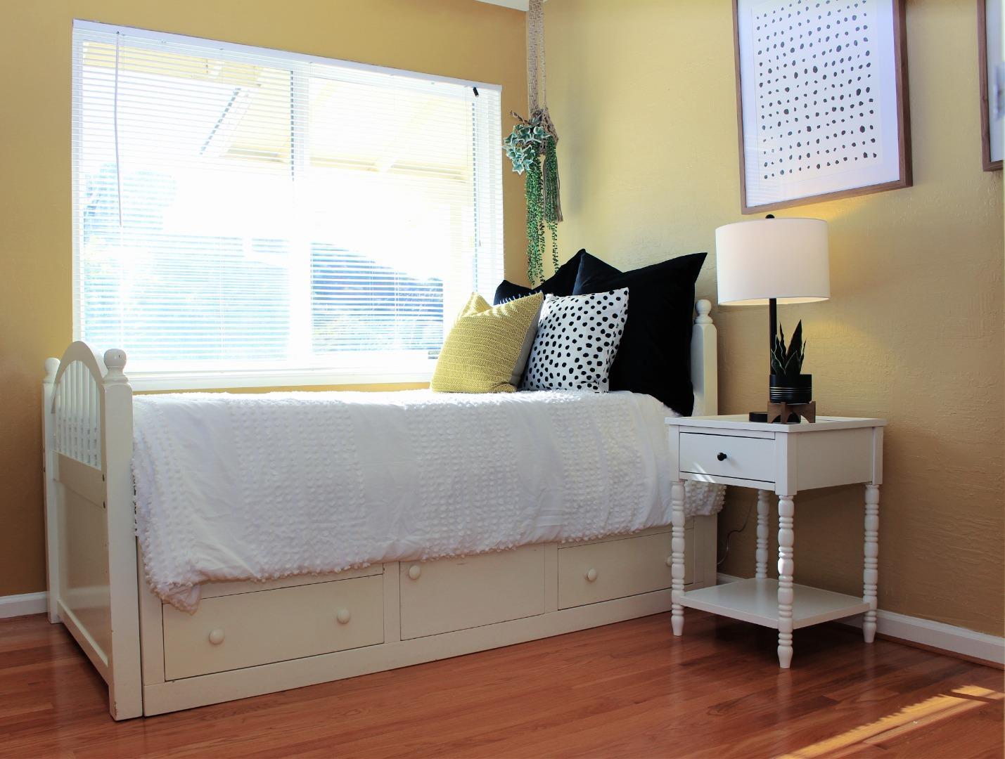 774 Prairie Creek Drive Pacifica, CA 94044 - Photo 18 of 29 a bedroom with a bed and a window