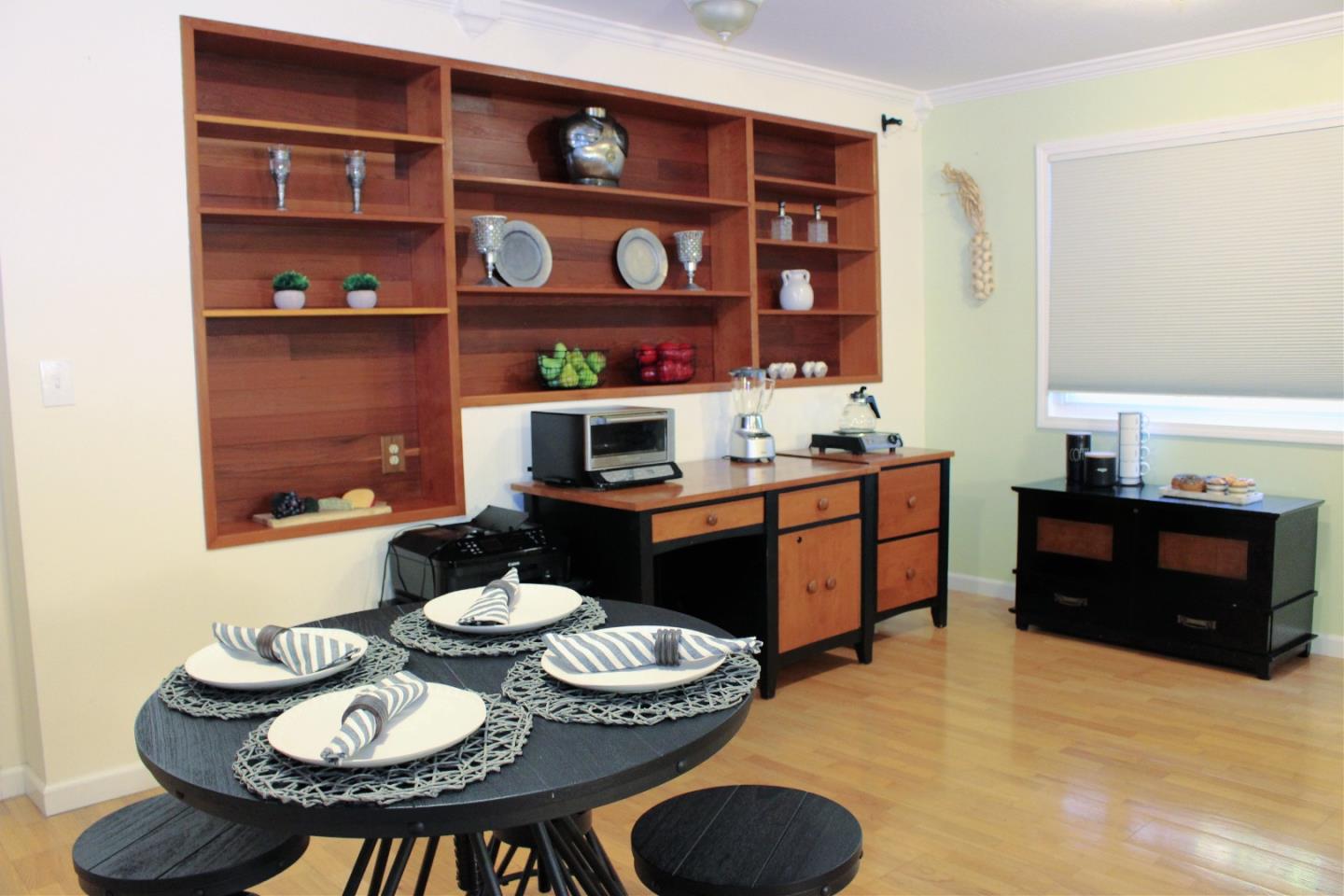 774 Prairie Creek Drive Pacifica, CA 94044 - Photo 20 of 29 a kitchen with a appliances and a dining table