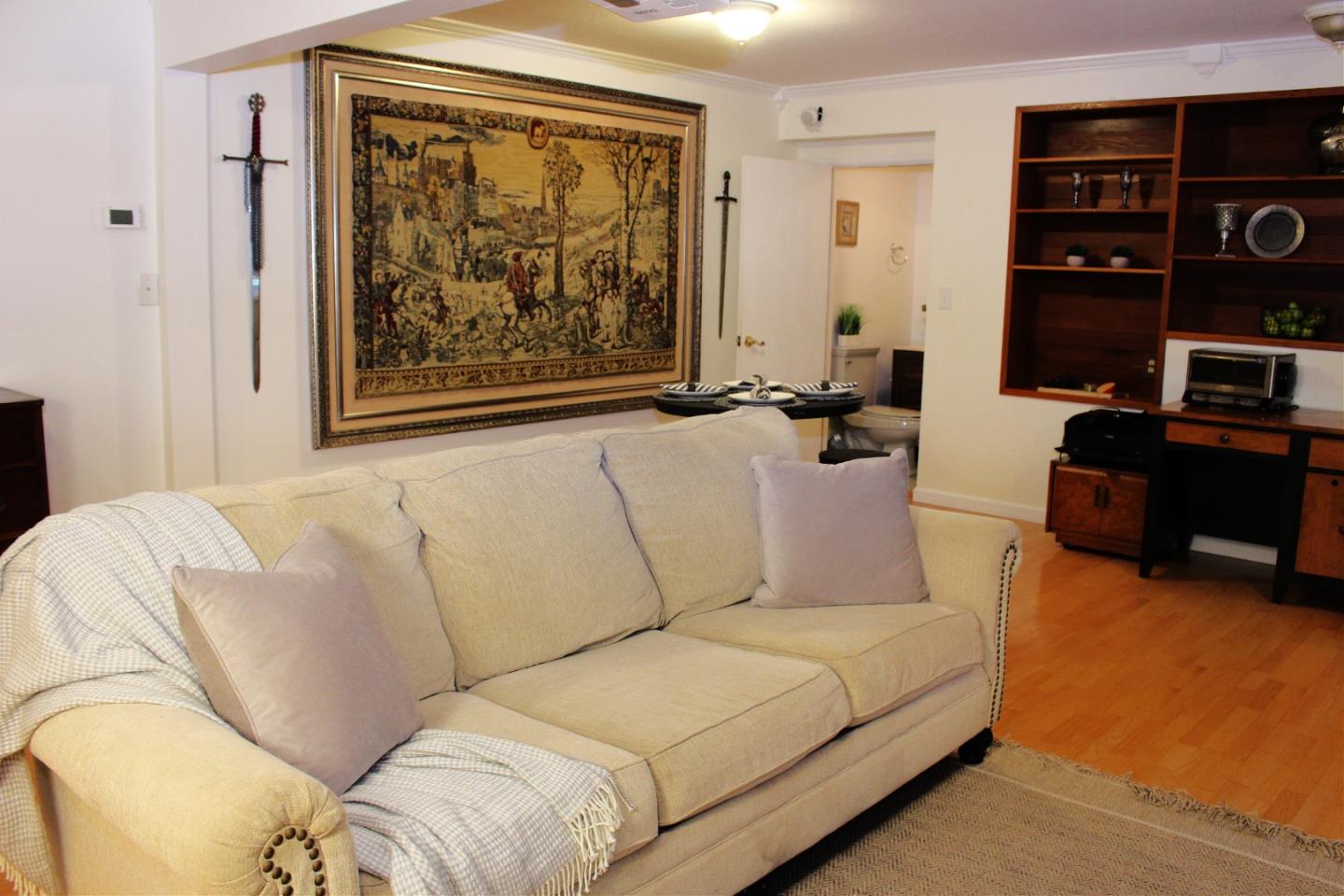 774 Prairie Creek Drive Pacifica, CA 94044 - Photo 24 of 29 a living room with furniture a lamp and a window