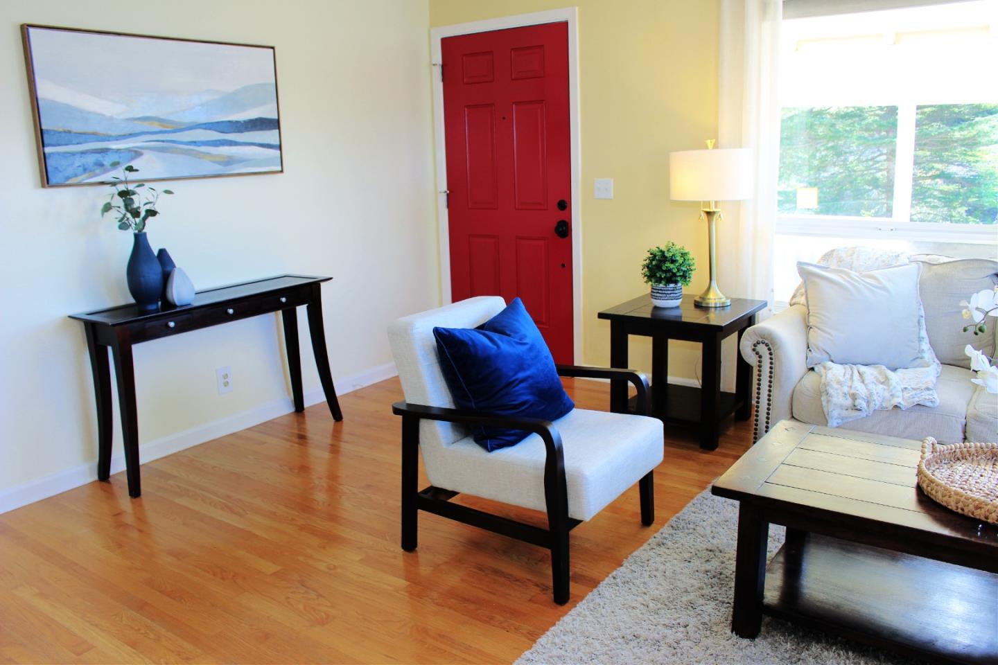 774 Prairie Creek Drive Pacifica, CA 94044 - Photo 4 of 29 a living room with furniture and a window