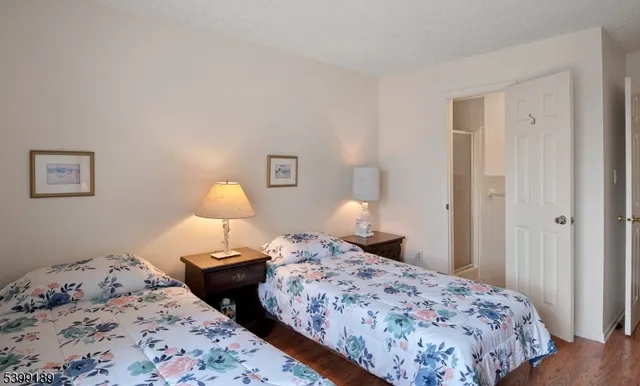 a bedroom with bed and bedroom