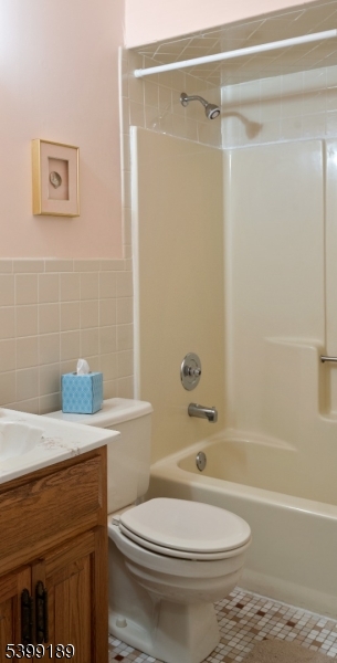 111 K Street, Unit A2 Seaside Park, NJ 08752 - Photo 10 of 15 a bathroom with a sink a toilet and a bathtub