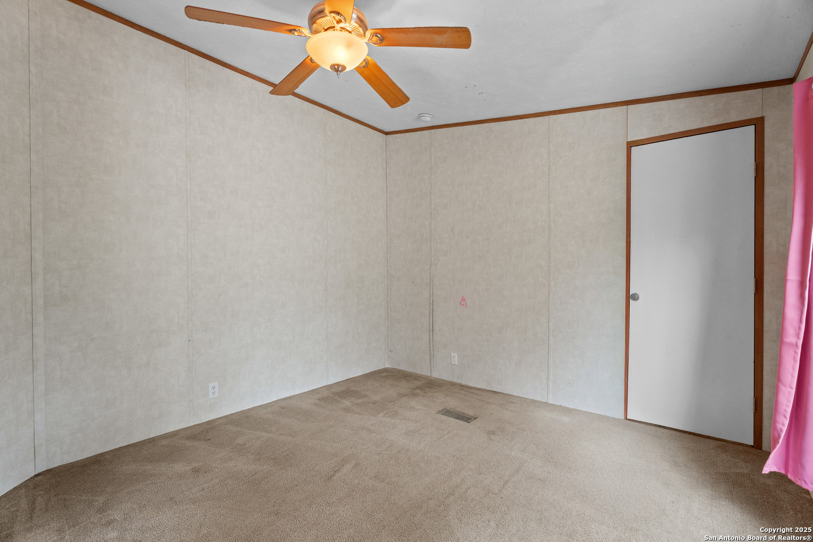 1100 Big Leaf Road San Antonio, TX 78264 - Photo 17 of 26 a view of a room with a fan and a window