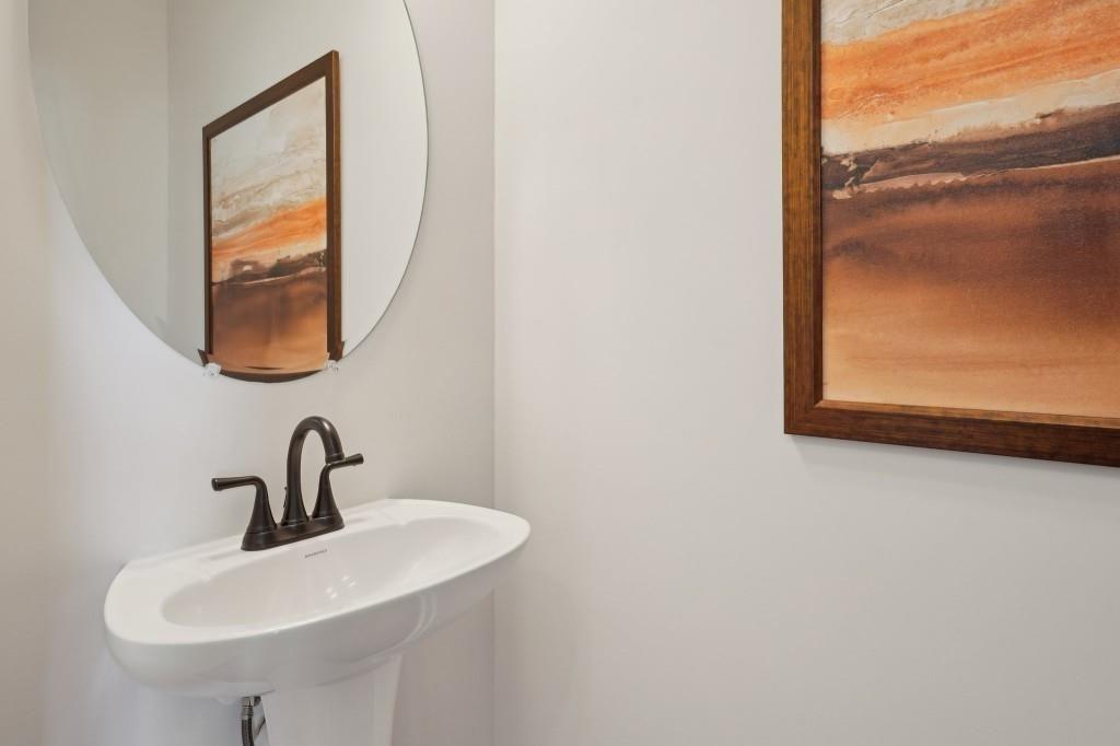 11 North Haven Drive Rome, GA 30161 - Photo 18 of 35 a bathroom with a sink and a mirror