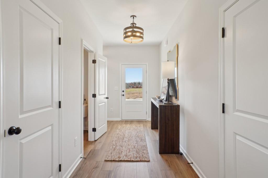 11 North Haven Drive Rome, GA 30161 - Photo 2 of 35 a view of a hallway view with wooden floor and a bathroom