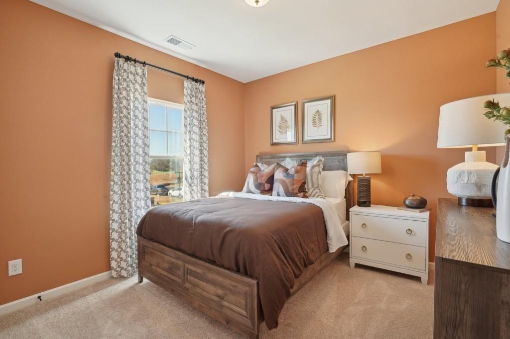 11 North Haven Drive Rome, GA 30161 - Photo 23 of 35 a bedroom with a bed and a night stand