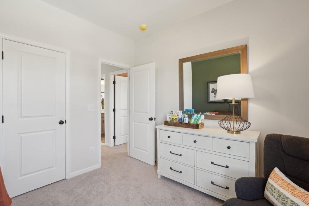 11 North Haven Drive Rome, GA 30161 - Photo 27 of 35 a bedroom with a bed and a dresser in it
