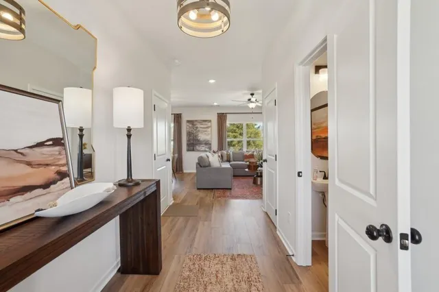 a living room with furniture and a table