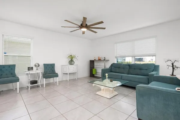 a living room with furniture and a window
