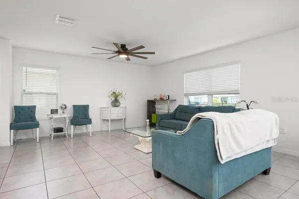 a living room with furniture and a window